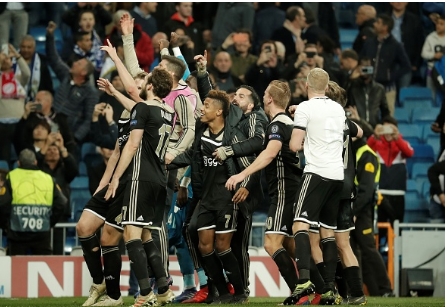 Ajax stun Real Madrid, as Tottenham progress past Dortmund