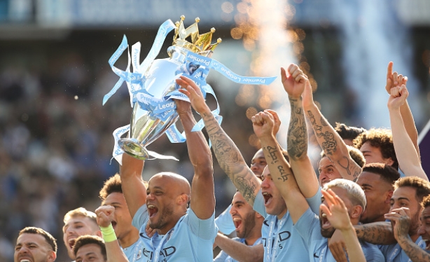 Manchester City retain Premier League title at Brighton
