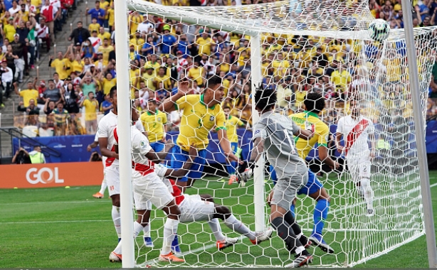 Brazil hammer Peru to top Group A